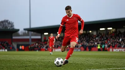 Paul Lewis scored the opening goal in Morecambe's 2-0 FA Cup win over Southport, with manager Adam Lakeland praising the...